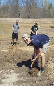 Students plant seedlings on a local ALUS farm