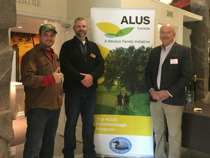 Doug Kennedy (ALUS Peterborough PAC Chair, on left), Henry Bakker (ALUS Peterborough Program Coordinator, centre) and Bryan Gilvesy (ALUS Canada CEO, on right) celebrate the partnership between ALUS Canada and the Ontario Federation of Anglers and Hunters at the official launch of the ALUS Peterborough program.